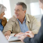 elderly couple discussing about domicile and estate planning